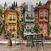 Galata Kulesi ve Renkli Cumbalı Evler Duvar Kağıdı Cumbalı evlerin, sarmaşıkların ve Galata Kulesi'nin resmedildiği İstanbul temalı duvar kağıdının masa arkasındaki görünümü.